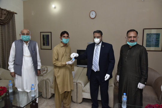 Worthy Vice Chancellor visits hostel and distributed Hand Sanitizers among Staff