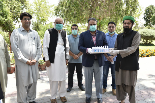 Worthy Vice Chancellor distributing Hand Sanitizers to University Employees