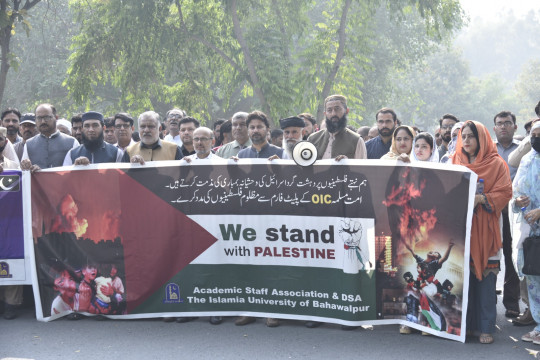 IUB organized a walk in solidarity with the Palestinian people at Badhdad-ul-Jadeed Campus