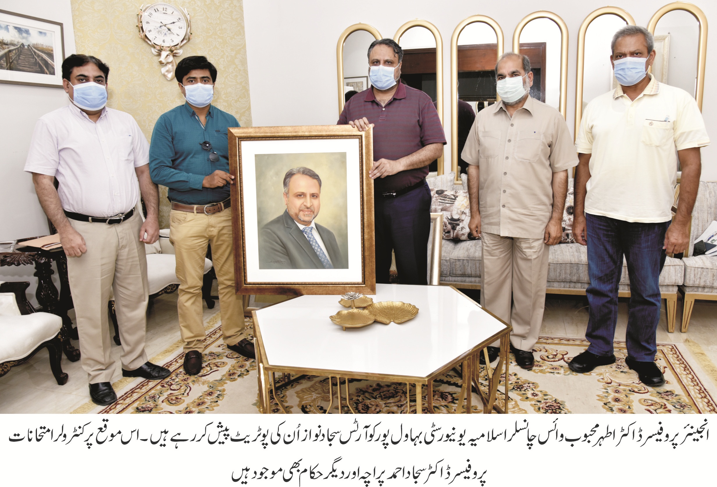 Artist Sajad Nawaz Presenting Potrait to VC